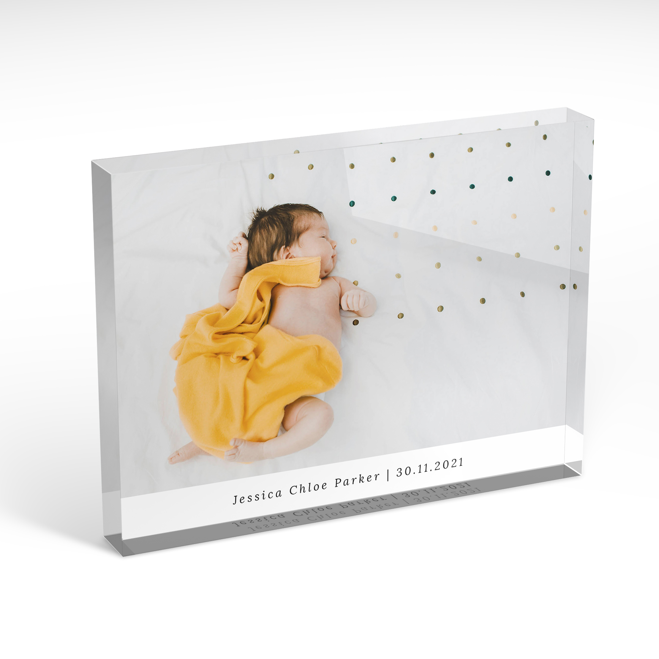 An angled side view of a landscape layout Acrylic Glass Photo Block with space for 1 photo. Thiis design is named "Baby's Day Out". 