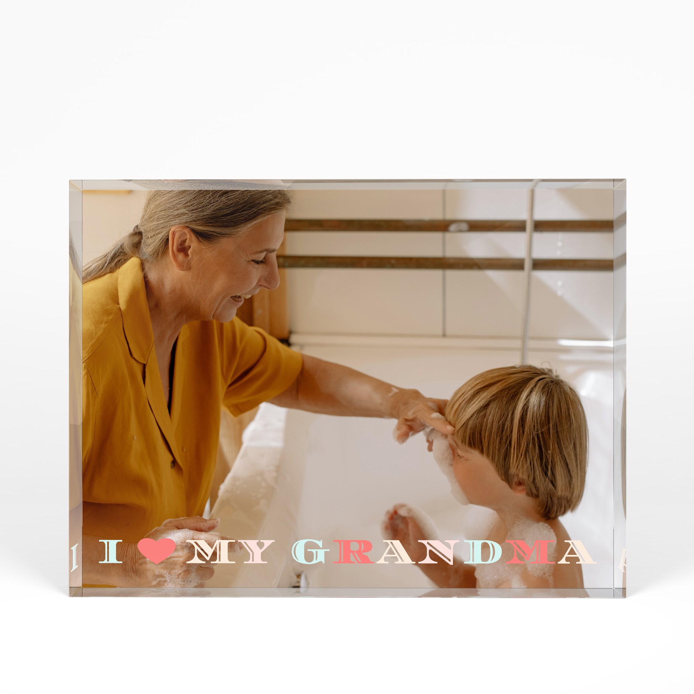 A front side view of a landscape layout Acrylic Photo Block with space for 1 photo. Thiis design is named "Granny's Love". 