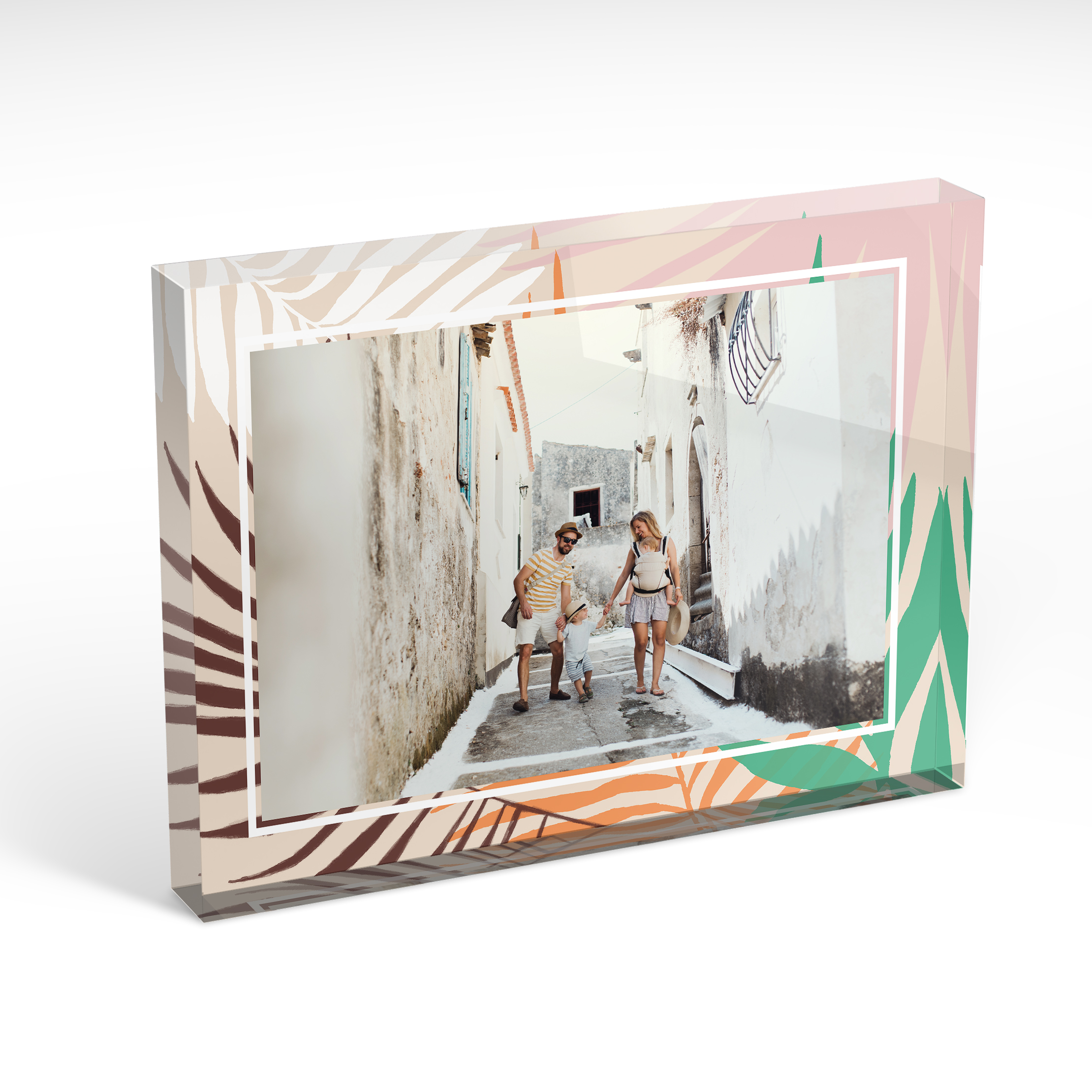 An angled side view of a landscape layout Acrylic Photo Block with space for 1 photo. Thiis design is named "Pastel Palms". 