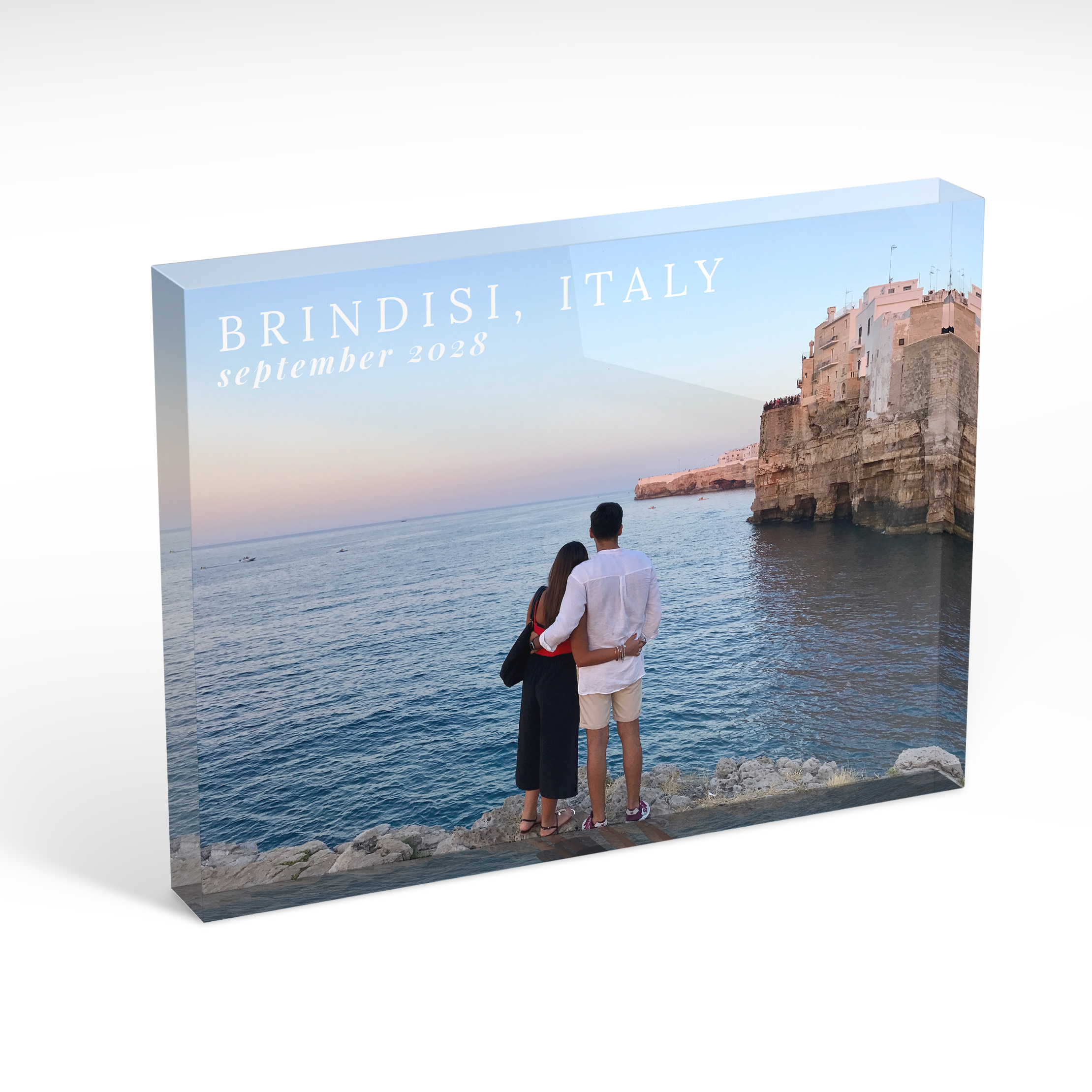 An angled side view of a landscape layout Acrylic Photo Block with space for 1 photo. Thiis design is named "Shared Moments". 