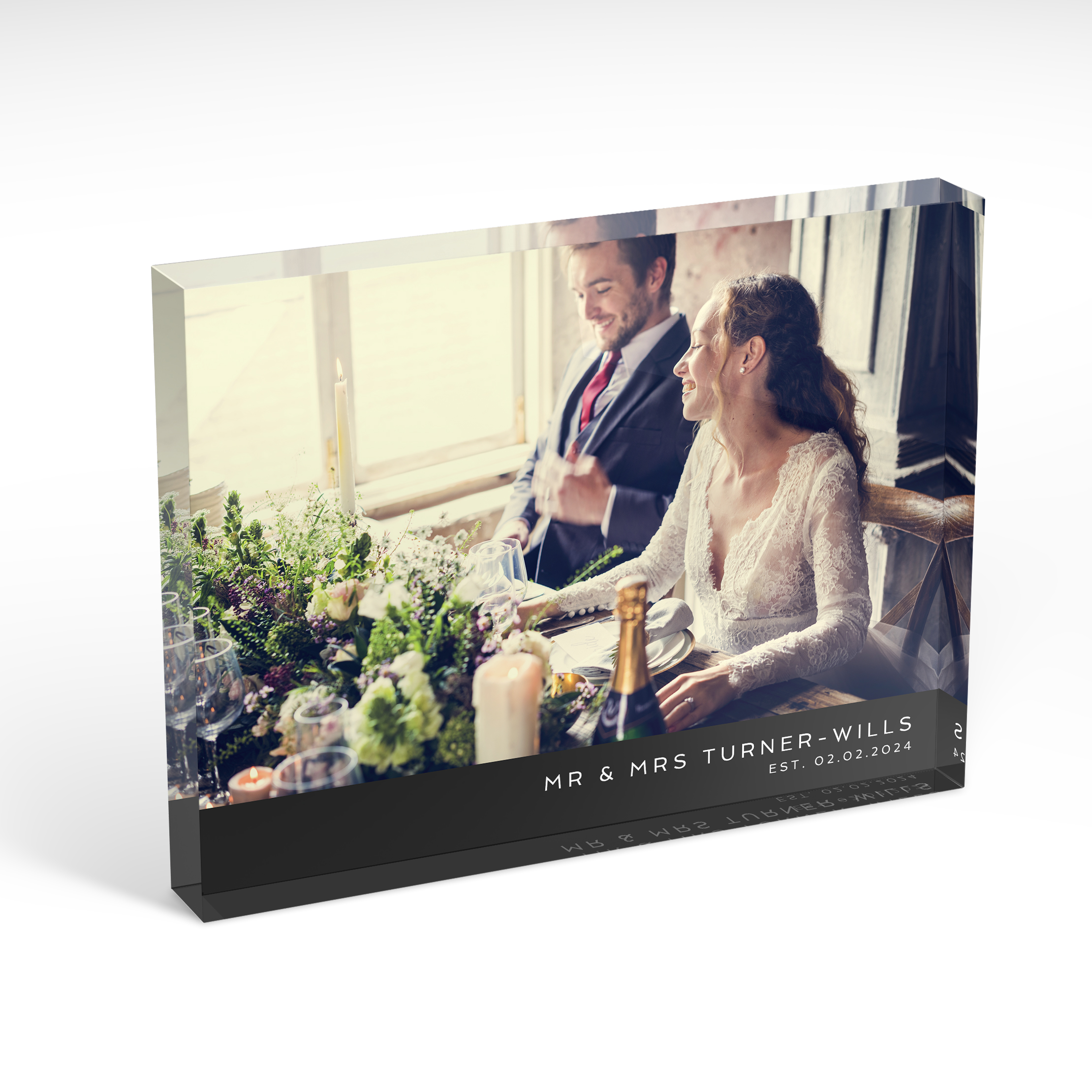 An angled side view of a landscape layout Acrylic Photo Block with space for 1 photo. Thiis design is named "Wedding Bliss". 