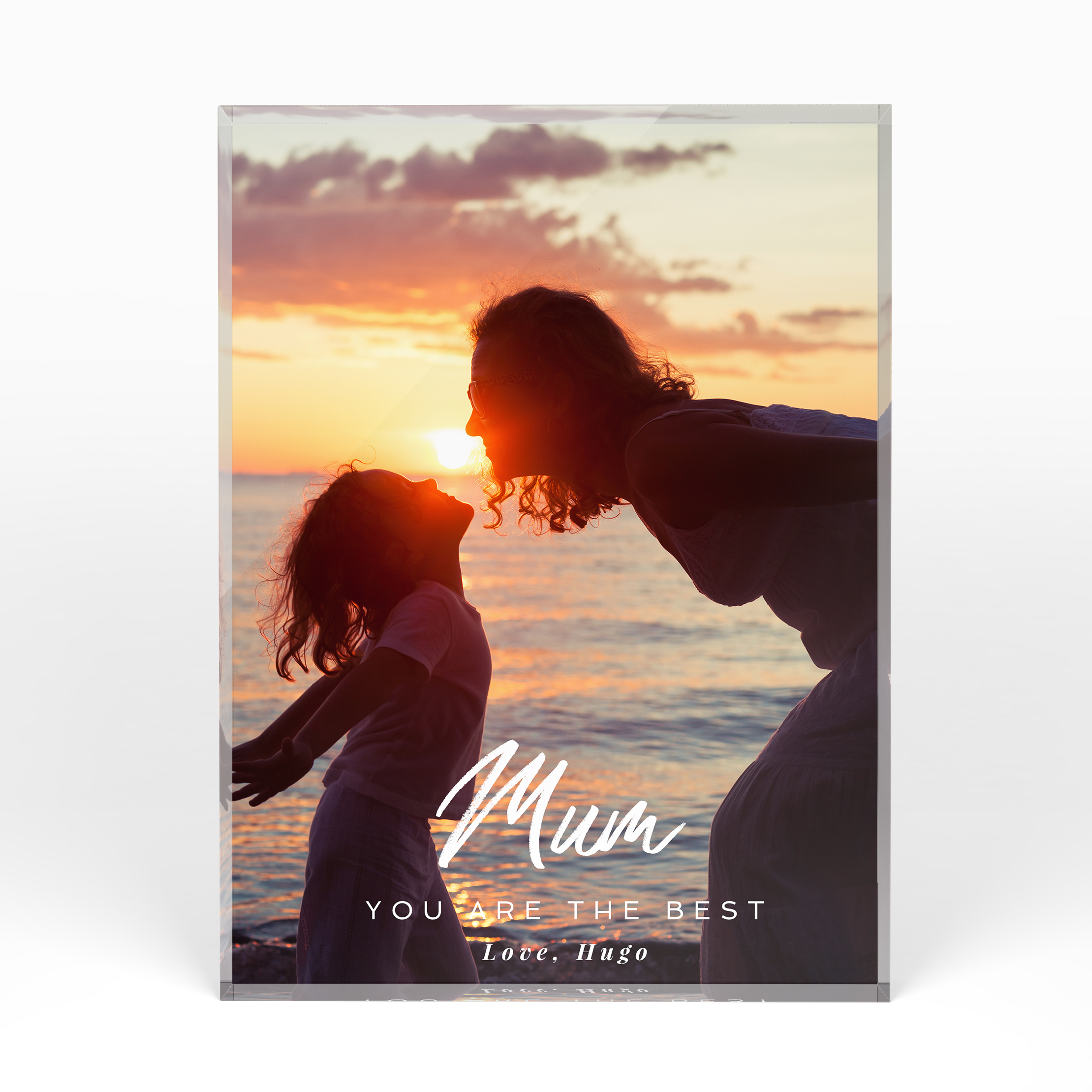 A front side view of a portrait layout Acrylic Glass Photo Block with space for 1 photo. Thiis design is named "A Mother's Embrace". 