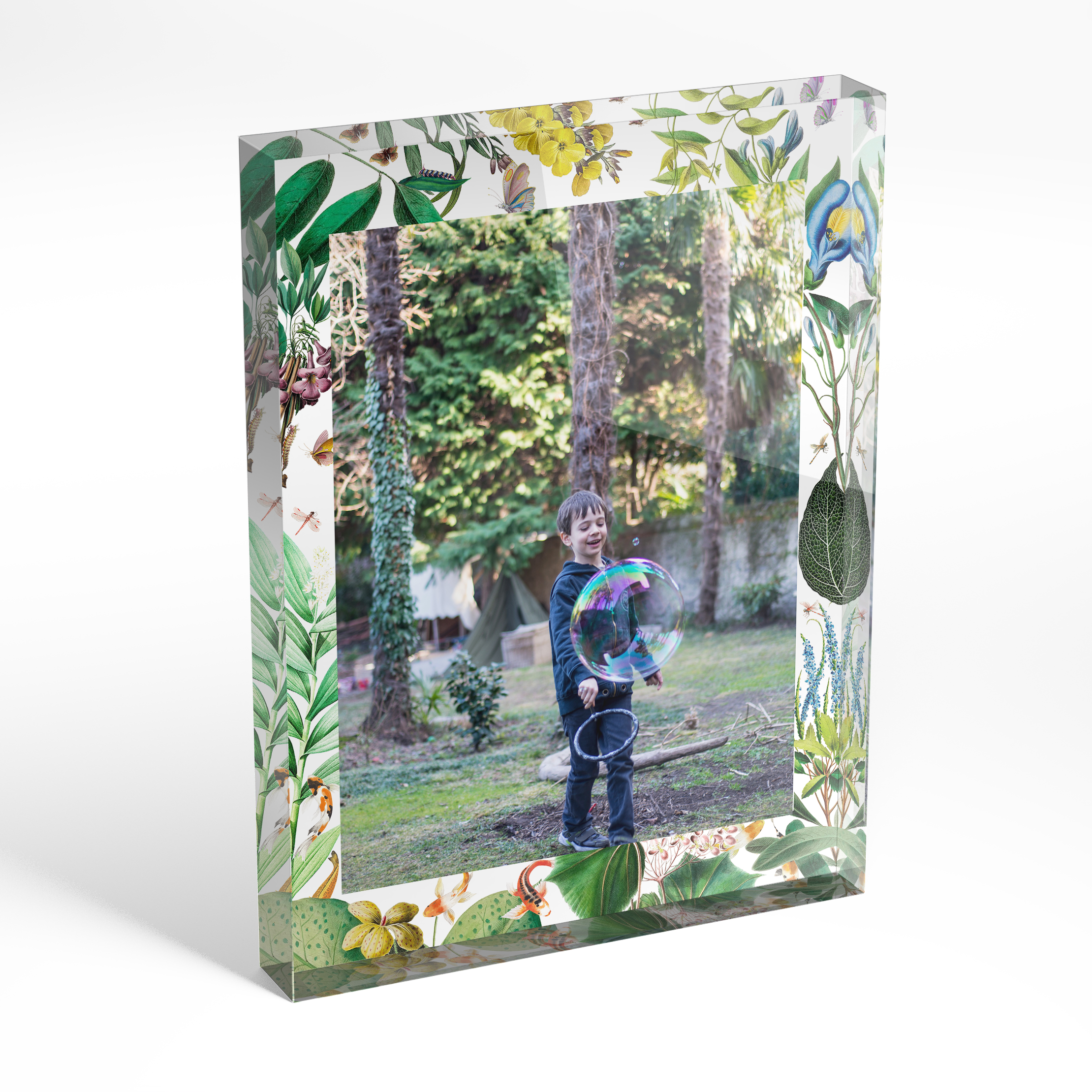 An angled side view of a portrait layout Acrylic Glass Photo Block with space for 1 photo. Thiis design is named "Fishpond Photo". 