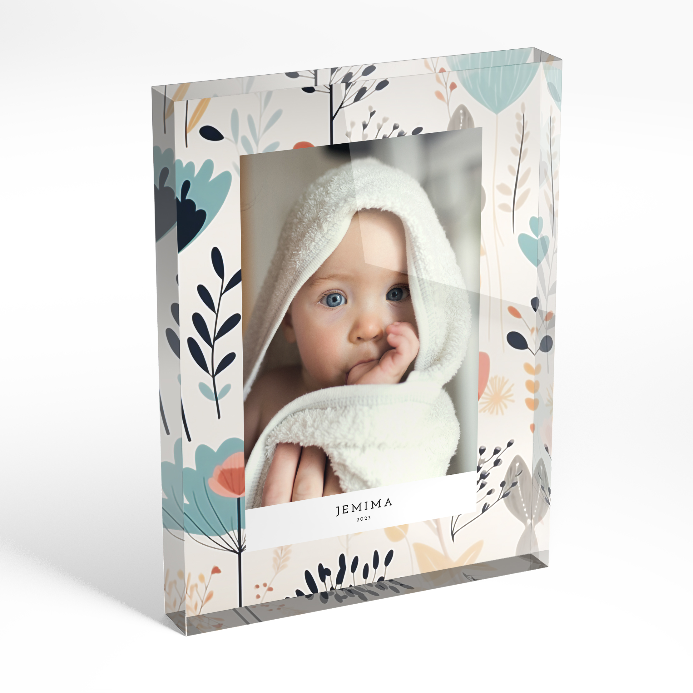 An angled side view of a portrait layout Acrylic Glass Photo Block with space for 1 photo. Thiis design is named "Floral cream frame". 