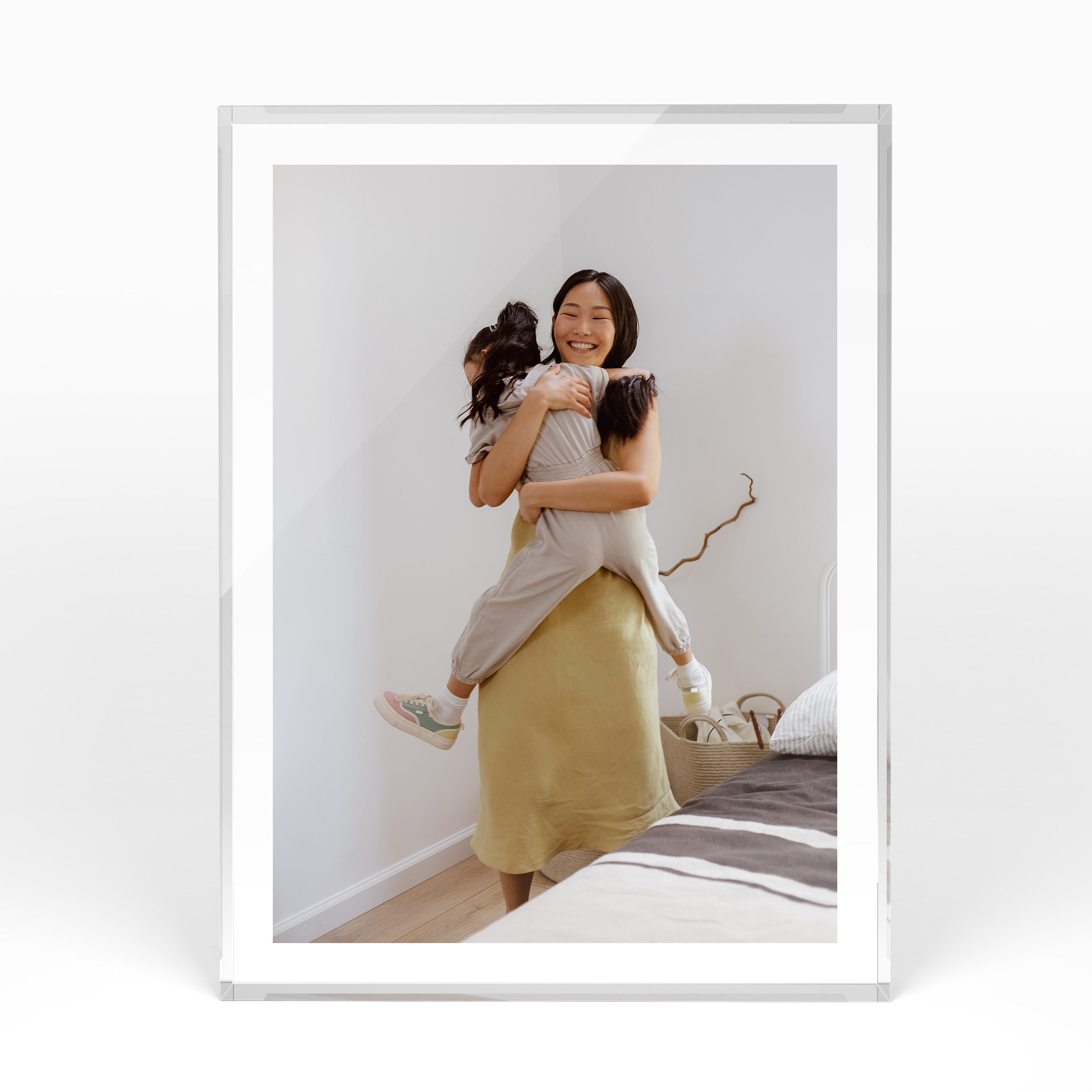 A front side view of a portrait layout Acrylic Glass Photo Block with space for 1 photo. Thiis design is named "Medium White Frame". 