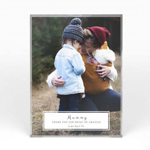 A front side view of a portrait layout Acrylic Glass Photo Block with space for 1 photo. Thiis design is named "Mom's Bottom Frame". 