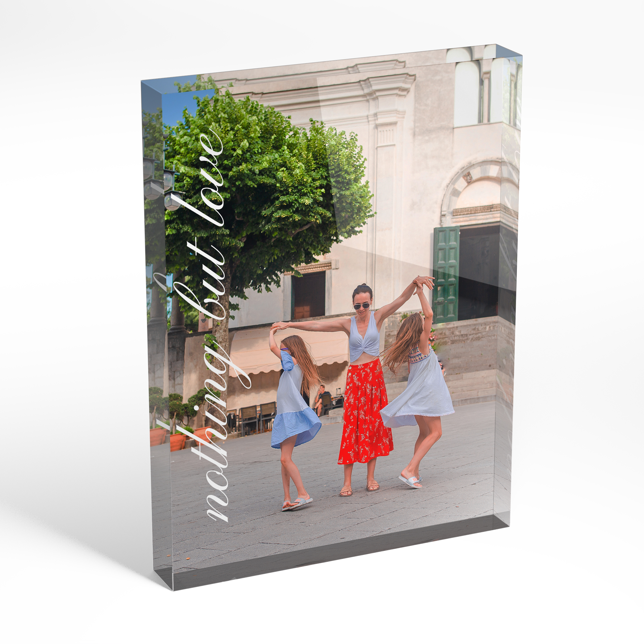 An angled side view of a portrait layout Acrylic Glass Photo Block with space for 1 photo. Thiis design is named "Nurturing Moments". 