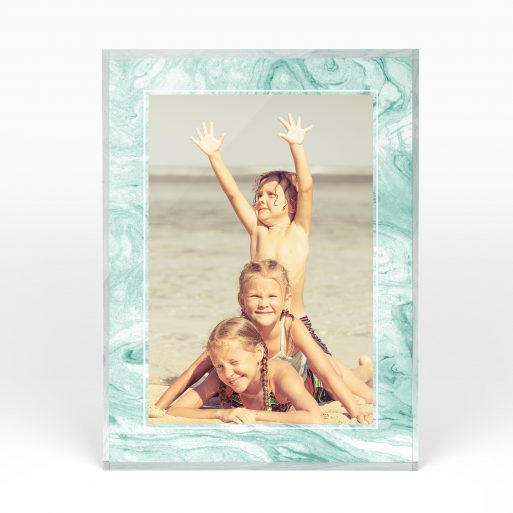 A front side view of a portrait layout Acrylic Glass Photo Block with space for 1 photo. Thiis design is named "Treasured Frame". 