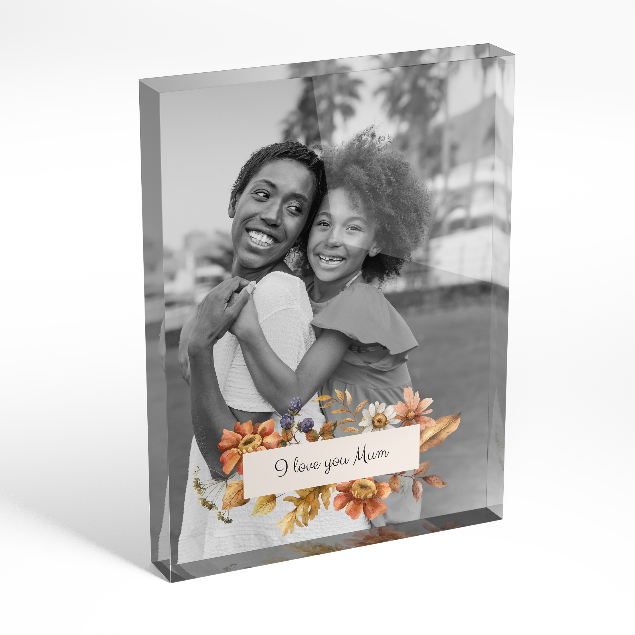 A front side view of a portrait layout Acrylic Glass Photo Block with space for 1 photo. Thiis design is named 'Blooming Motherhood'. 