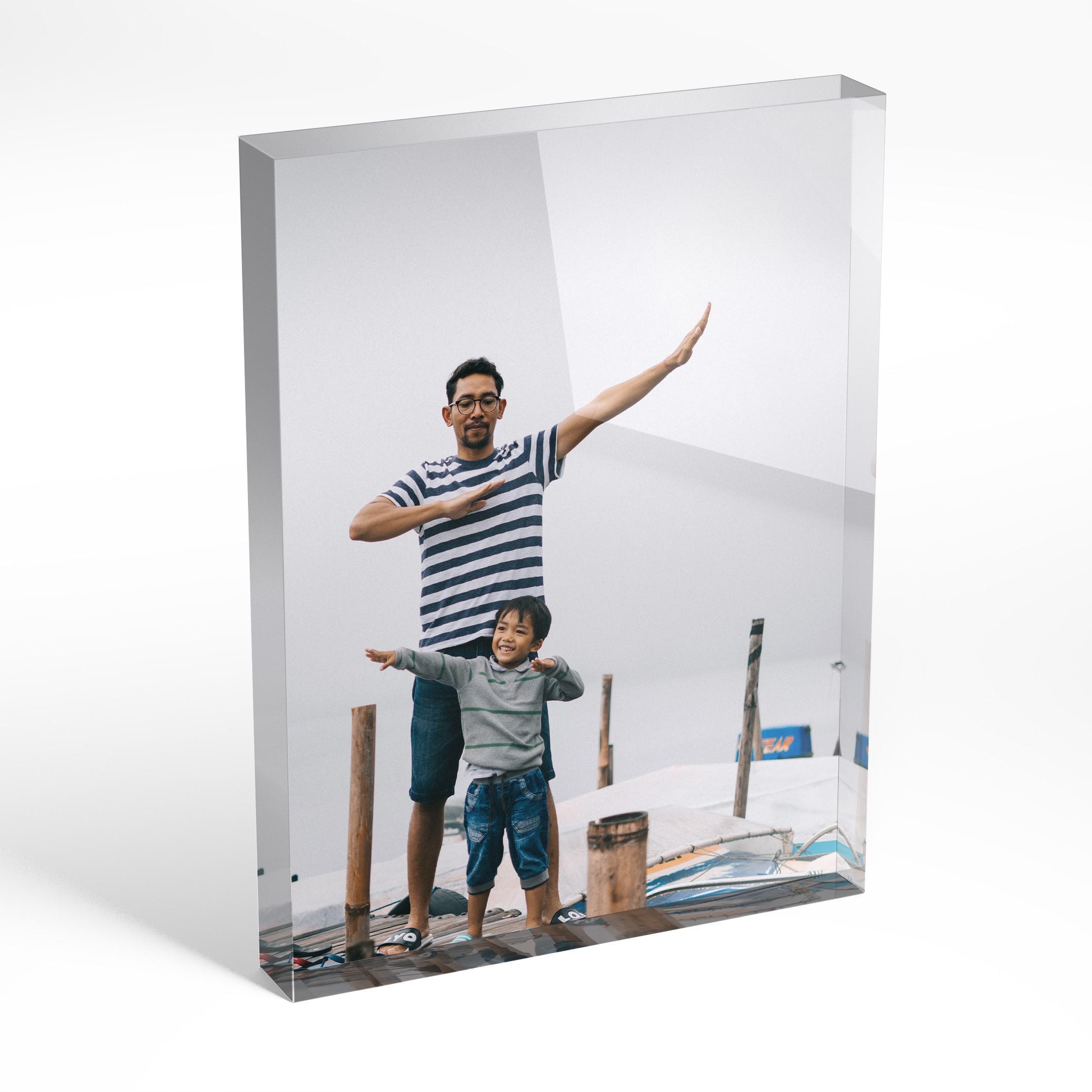 An angled side view of a portrait layout Acrylic Photo Block with space for 1 photo. Thiis design is named "Fatherly Festivities". 