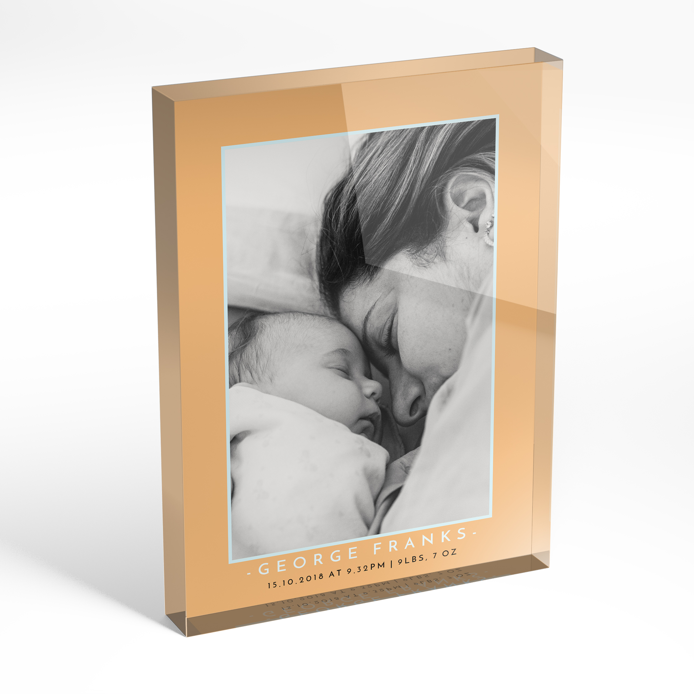 An angled side view of a portrait layout Acrylic Photo Block with space for 1 photo. Thiis design is named "Orange and Mint". 