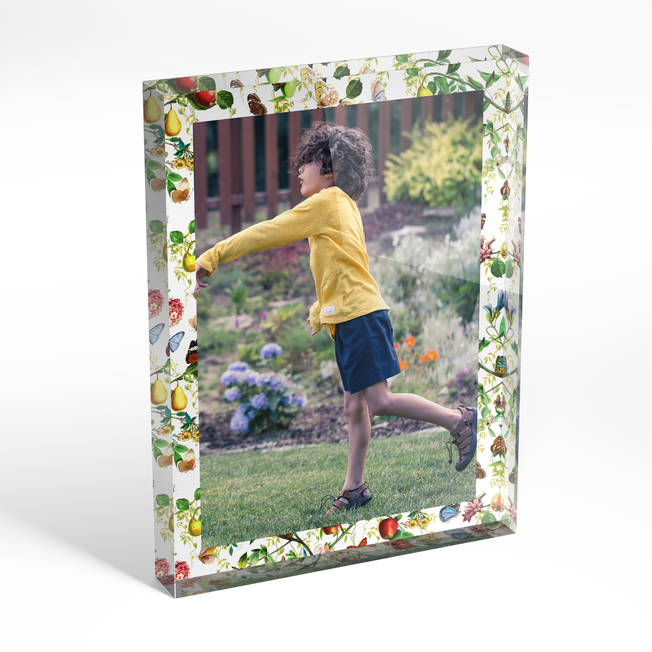 An angled side view of a portrait layout Acrylic Photo Block with space for 1 photo. Thiis design is named "Timeless Treasure". 