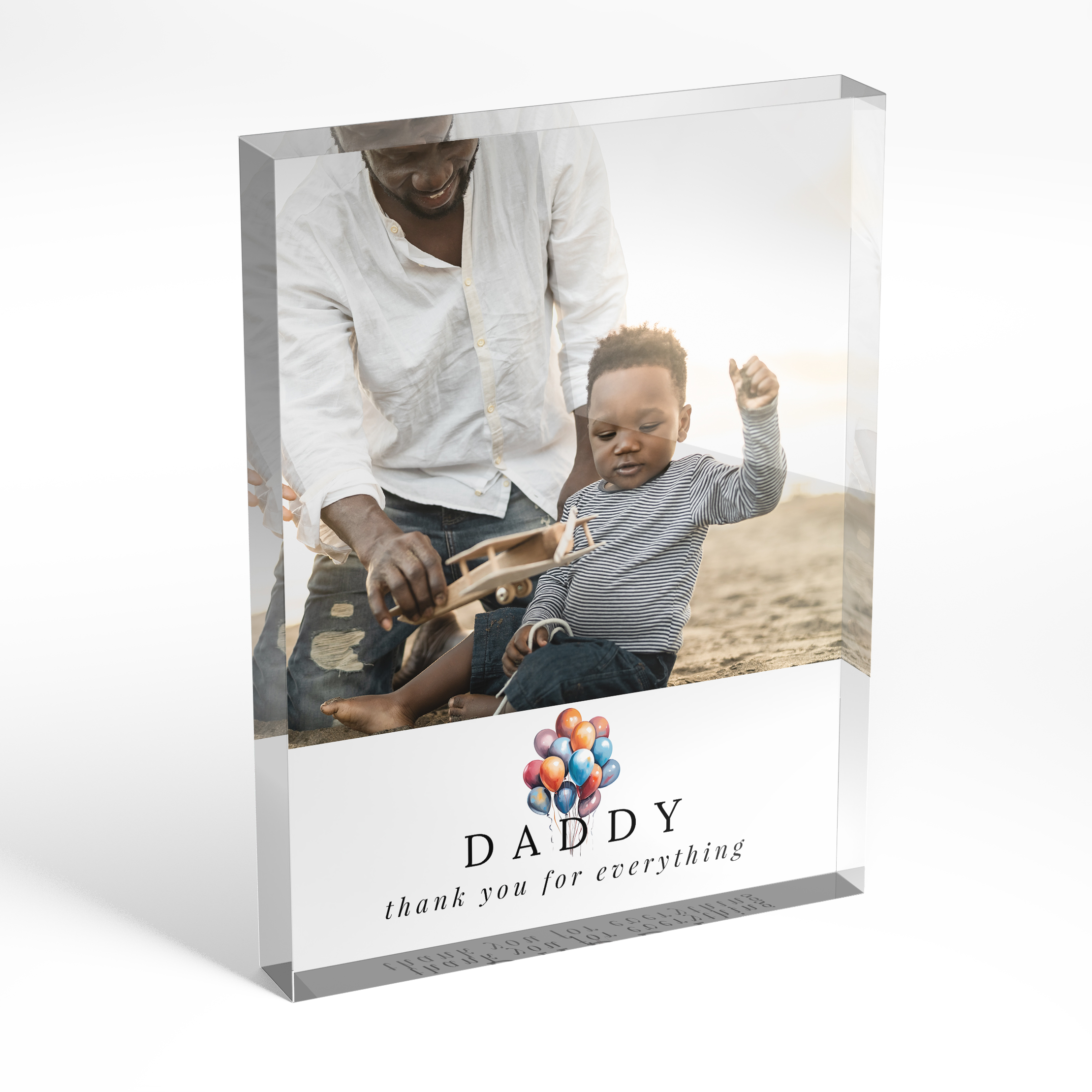 A front side view of a portrait layout Online acrylic photo blocks with space for 1 photo. Thiis design is named 'Balloons for dad'. 