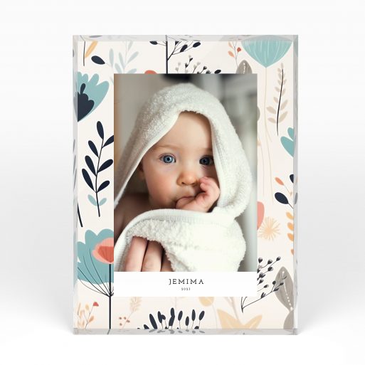 A front side view of a portrait layout Acrylic Photo Gift with space for 1 photo. Thiis design is named "Floral cream frame". 