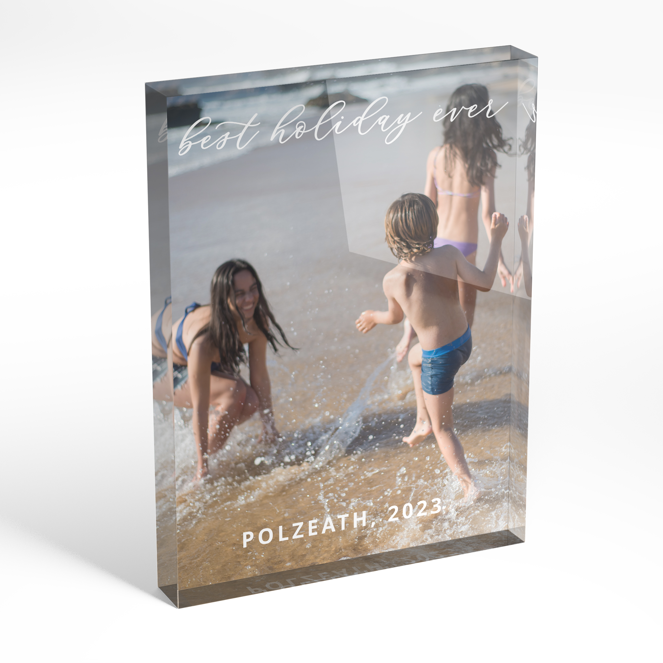 An angled side view of a portrait layout Online acrylic photo blocks with space for 1 photo. Thiis design is named "Best holiday ever". 
