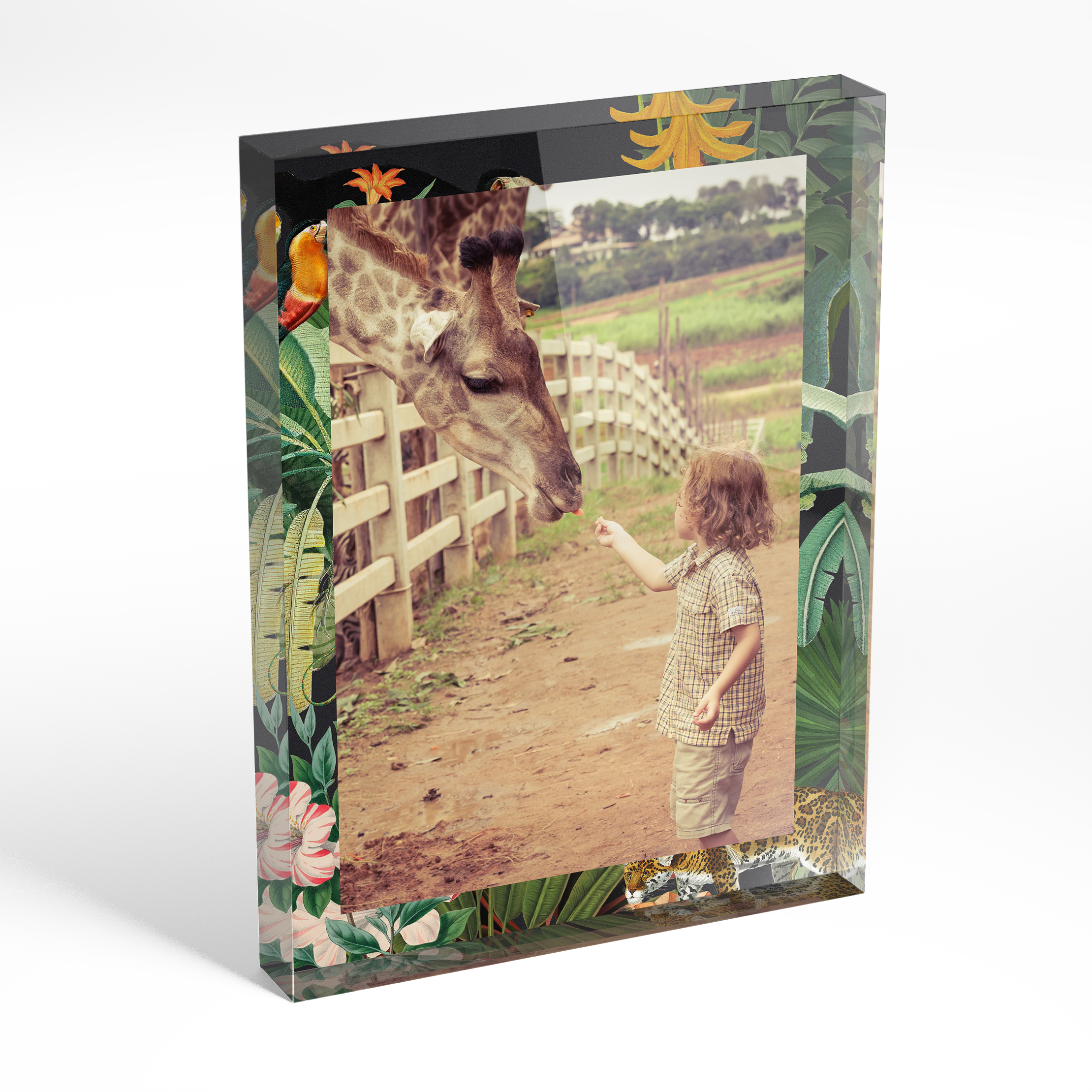An angled side view of a portrait layout Online acrylic photo blocks with space for 1 photo. Thiis design is named "Jungle Sparkle". 