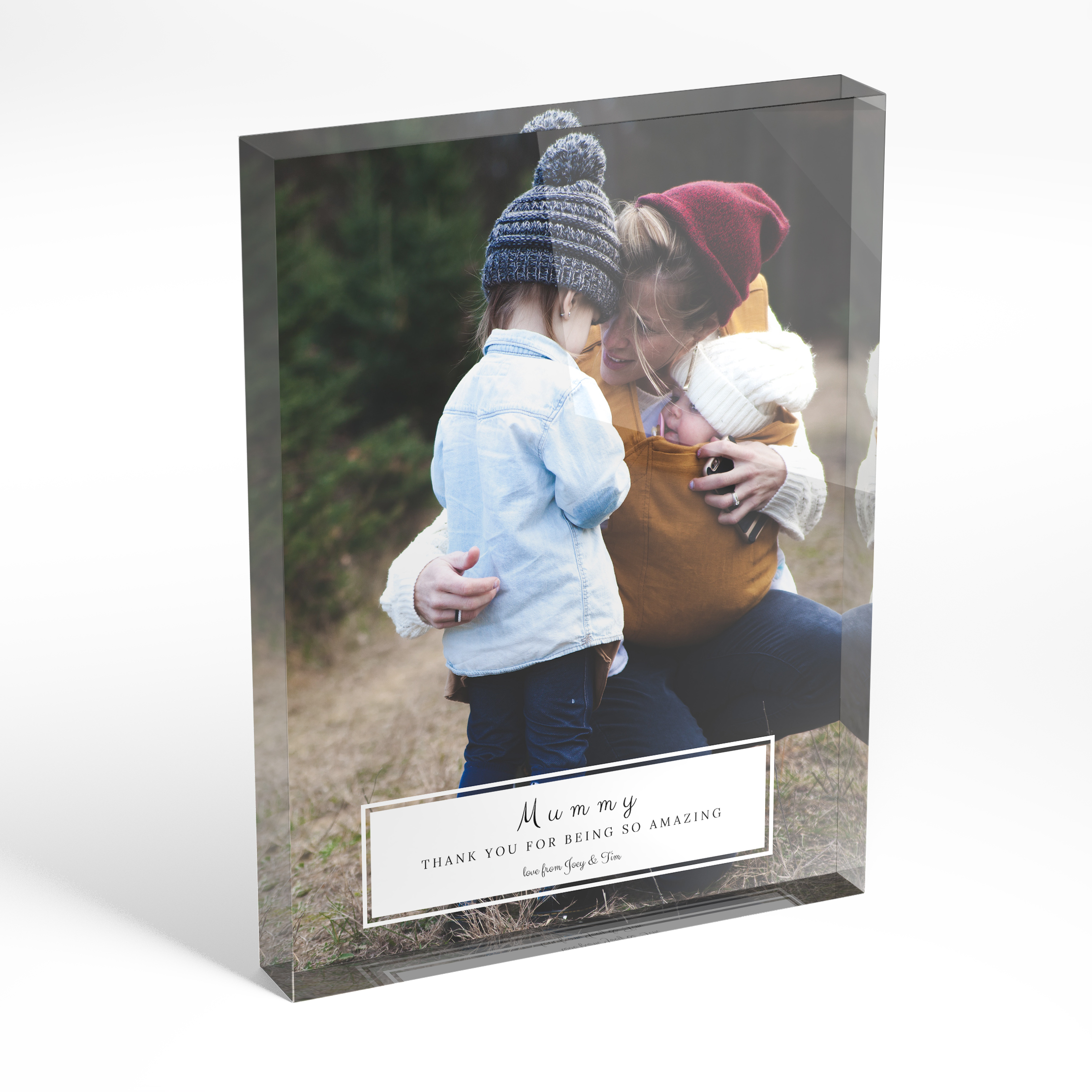 An angled side view of a portrait layout Perspex Photo Blocks with space for 1 photo. Thiis design is named "Mom's Bottom Frame". 