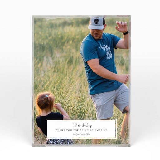 A front side view of a portrait layout Perspex Photo Blocks with space for 1 photo. Thiis design is named "Paternal Bottom Frame". 