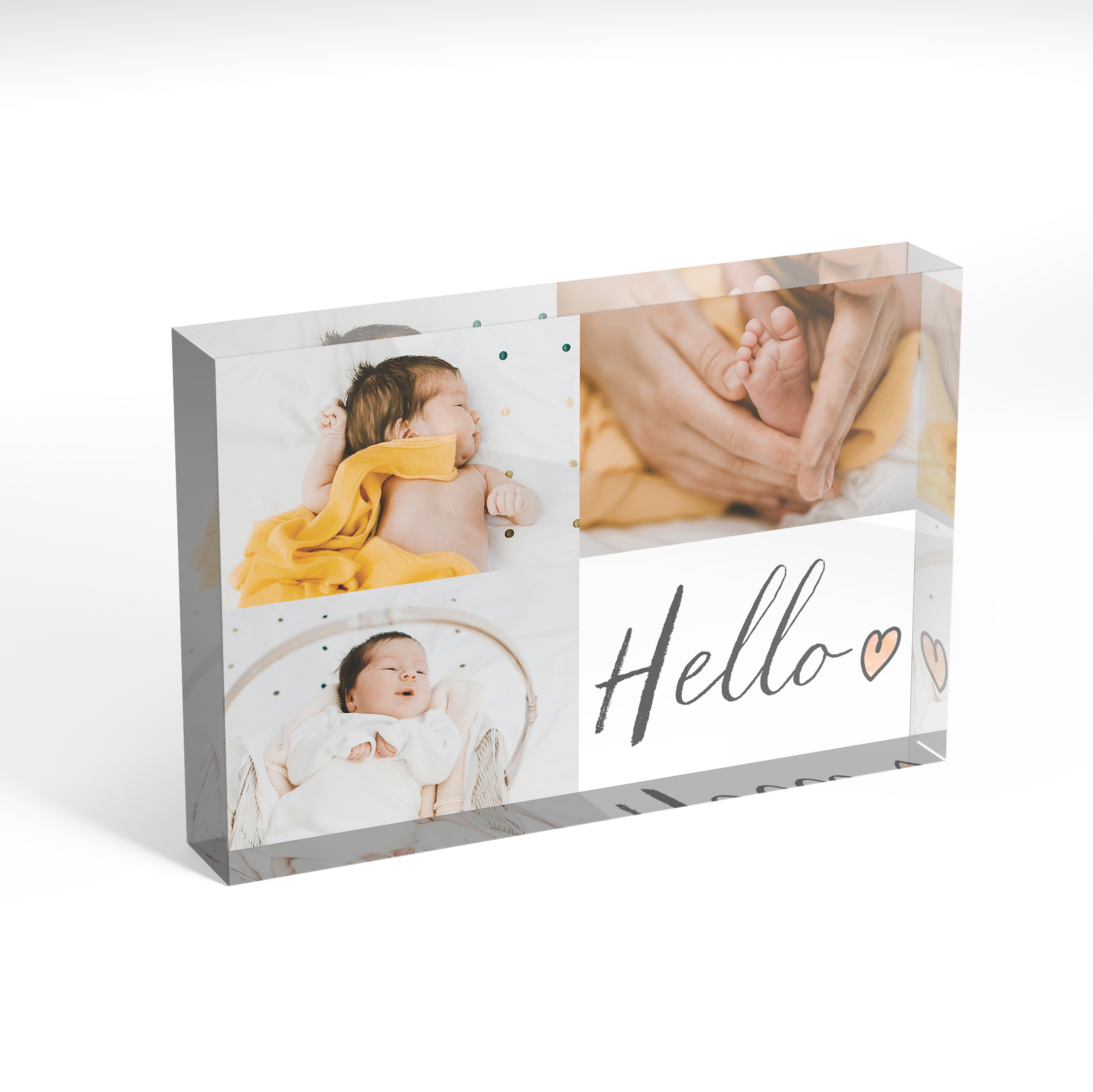 A front side view of a landscape layout Perspex Photo Blocks with space for 3 photos. Thiis design is named 'Triple Play Hello'. 