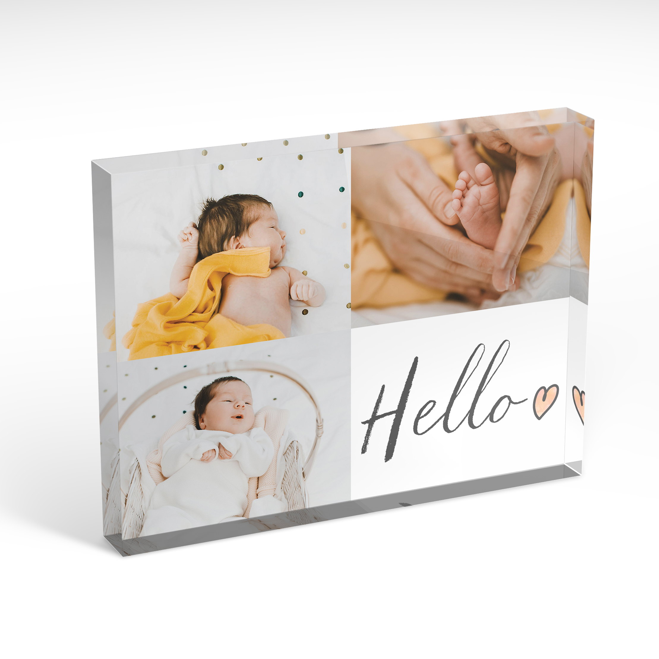 A front side view of a landscape layout Acrylic Photo Block with space for 3 photos. Thiis design is named 'Triple Play Hello'. 