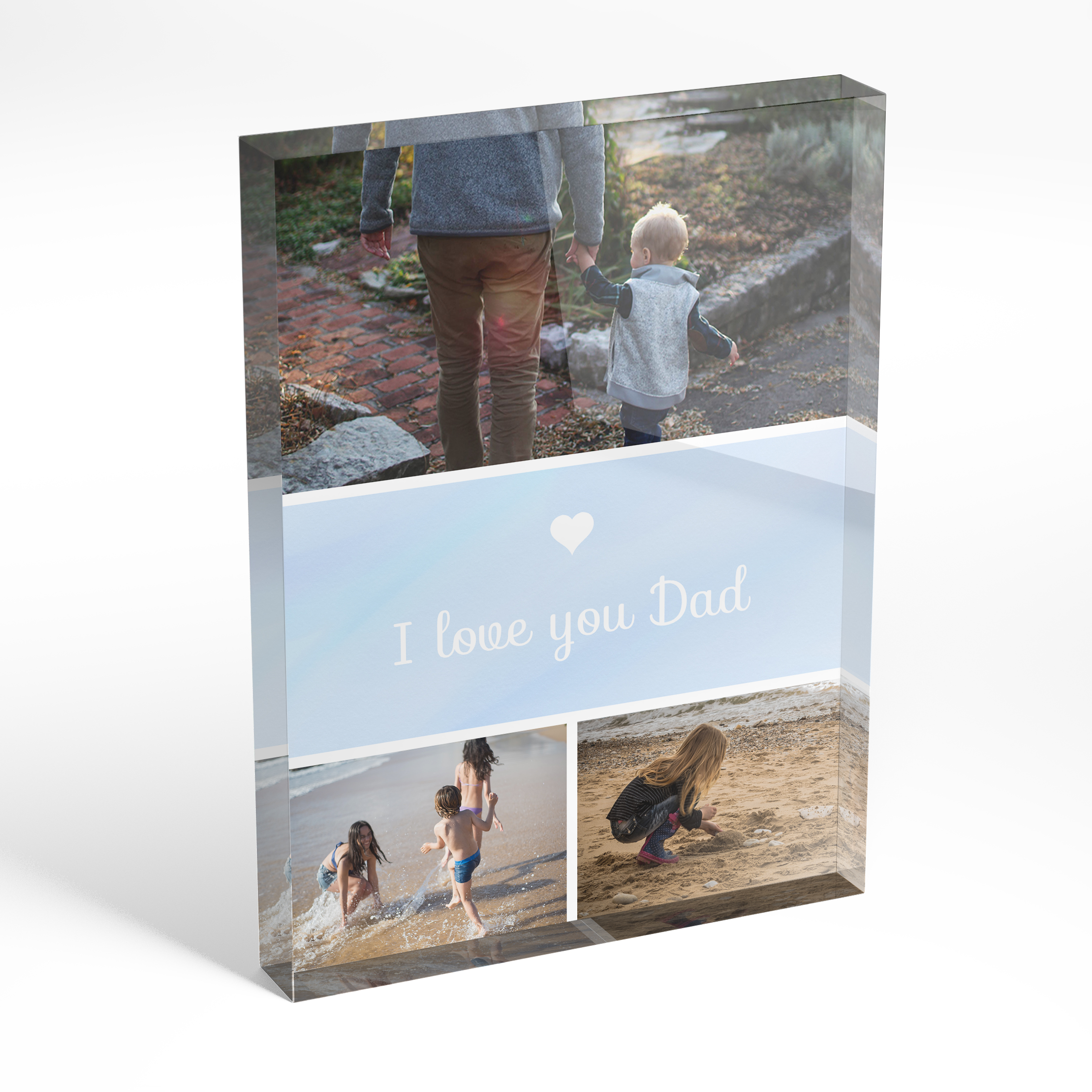 An angled side view of a portrait layout Acrylic Glass Photo Block with space for 3 photos. Thiis design is named "Father's Day Trio". 