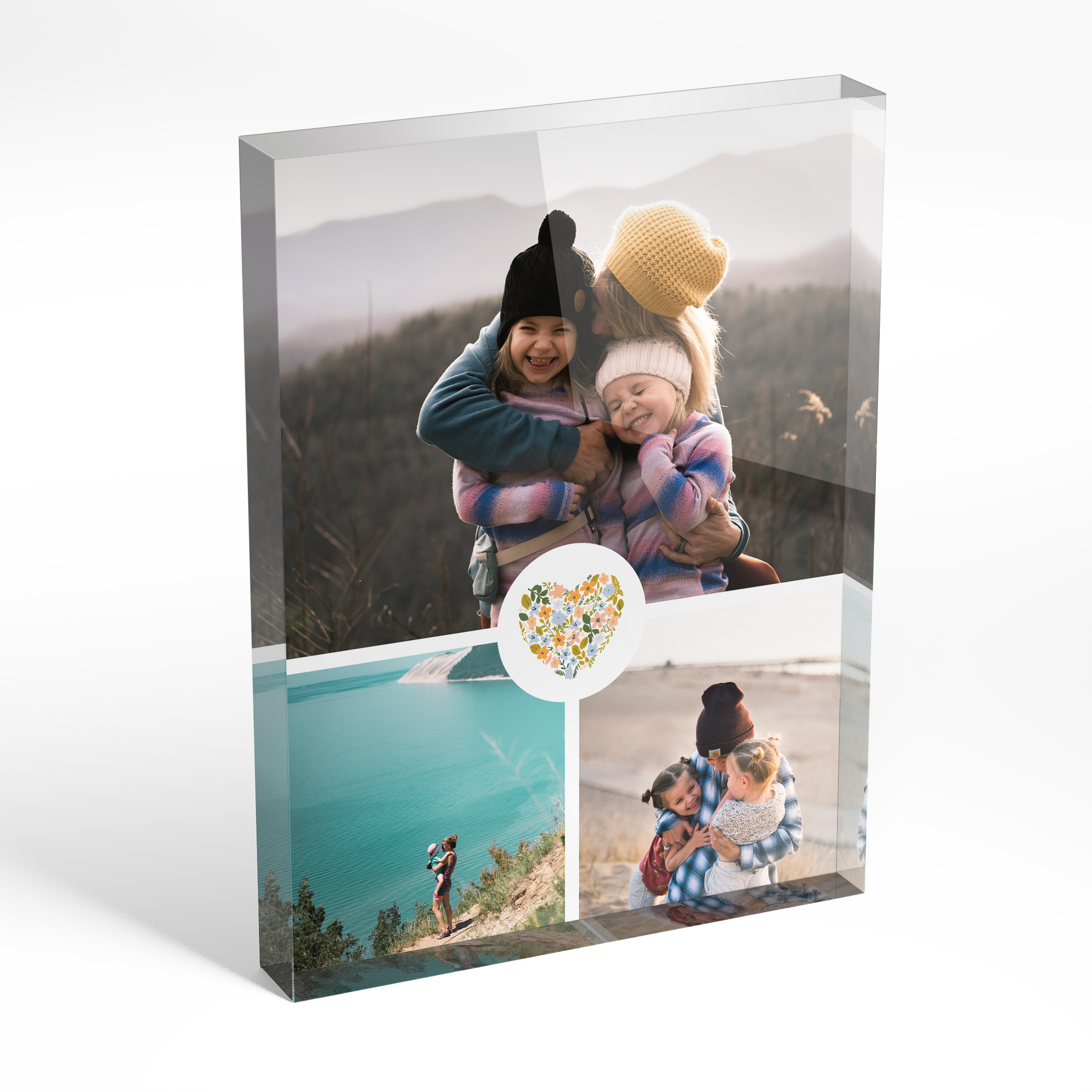 An angled side view of a portrait layout Online acrylic photo blocks with space for 3 photos. Thiis design is named "Floral Heart". 