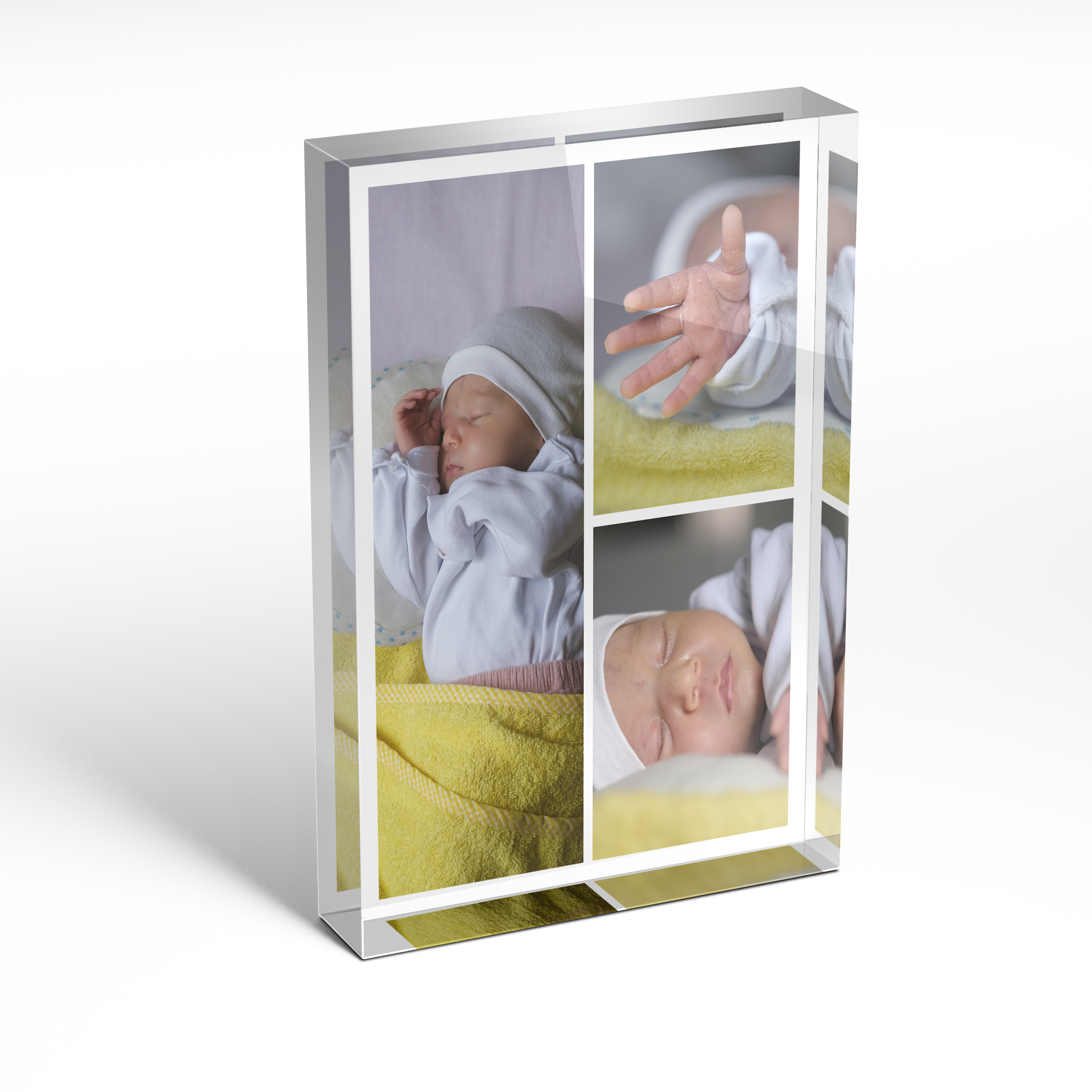 A front side view of a portrait layout Acrylic Glass Photo Block with space for 3 photos. Thiis design is named 'Cherished Child'. 