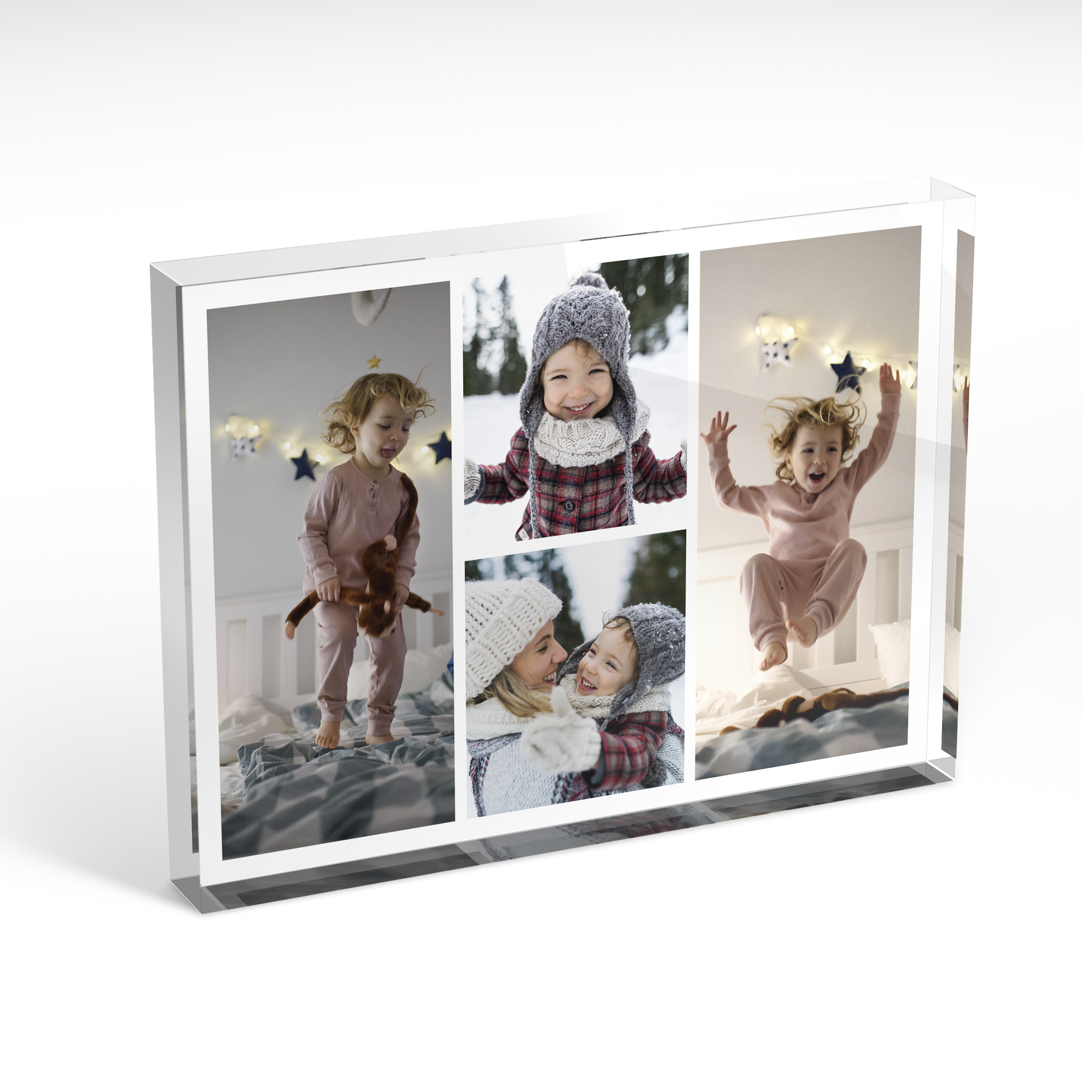 A front side view of a landscape layout Acrylic Glass Photo Block with space for 4 photos. Thiis design is named 'Quartet Collage'. 