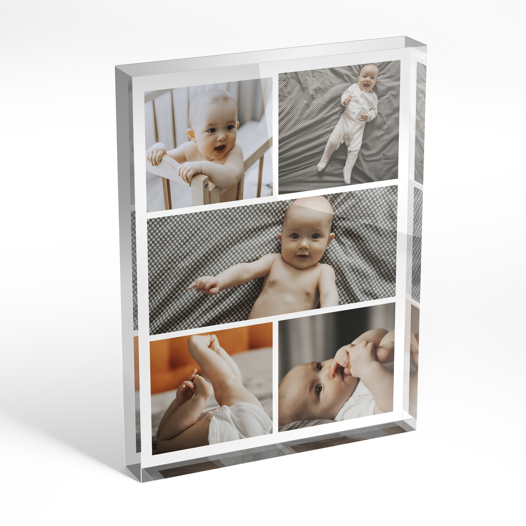 An angled side view of a portrait layout Acrylic Glass Photo Block with space for 5 photos. Thiis design is named "Childhood Kaleidoscope". 