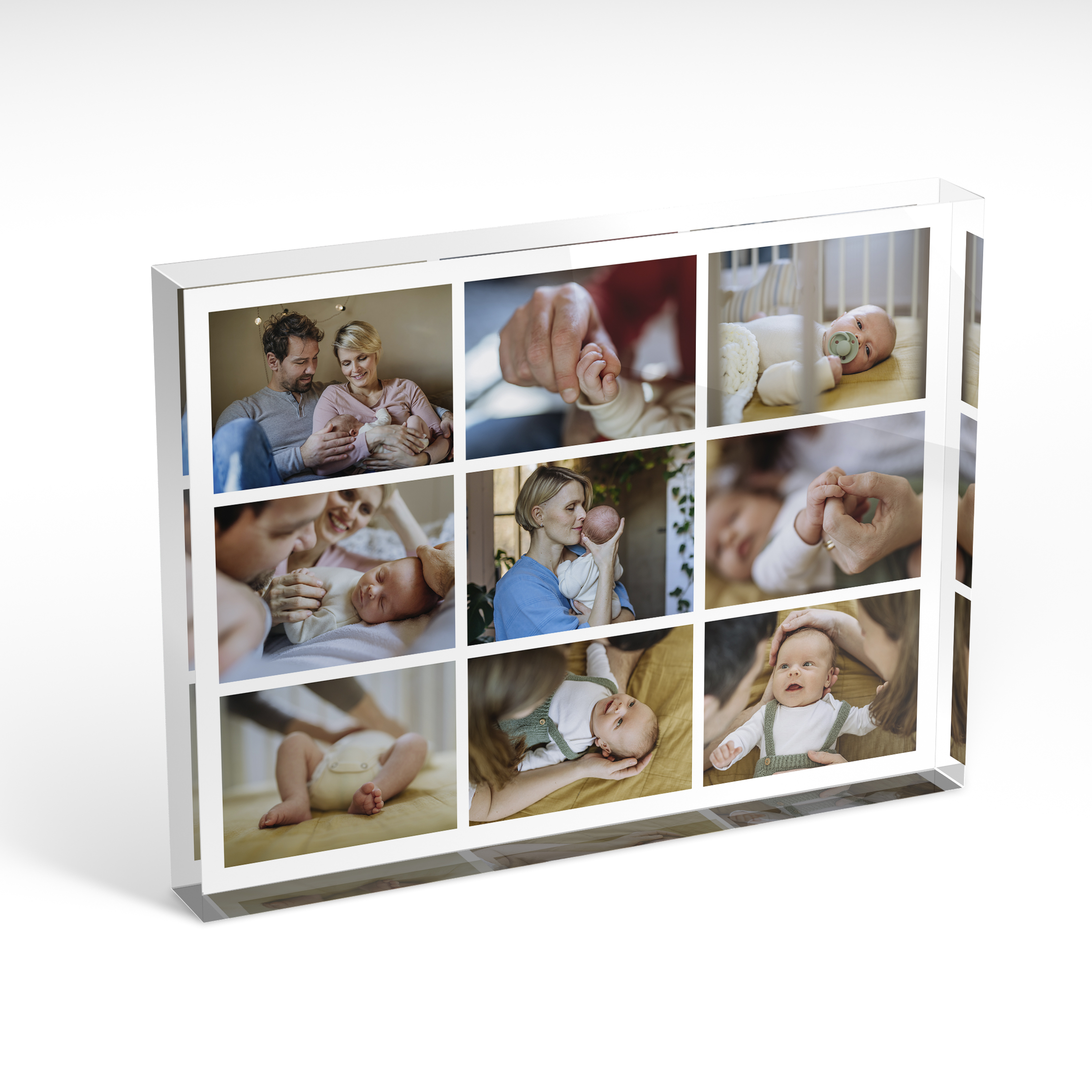 A front side view of a landscape layout Perspex Photo Blocks with space for 9 photos. Thiis design is named '9-fold'. 