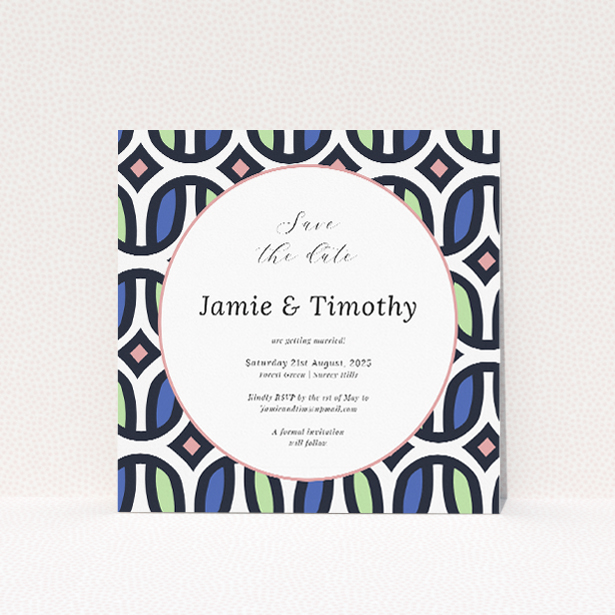 90s wedding save the date card featuring a playful geometric background in navy, peach, and sage green, reminiscent of the vibrant colours and bold patterns of the era, perfect for couples seeking a stylish and whimsically nostalgic announcement for their wedding event This is a view of the front