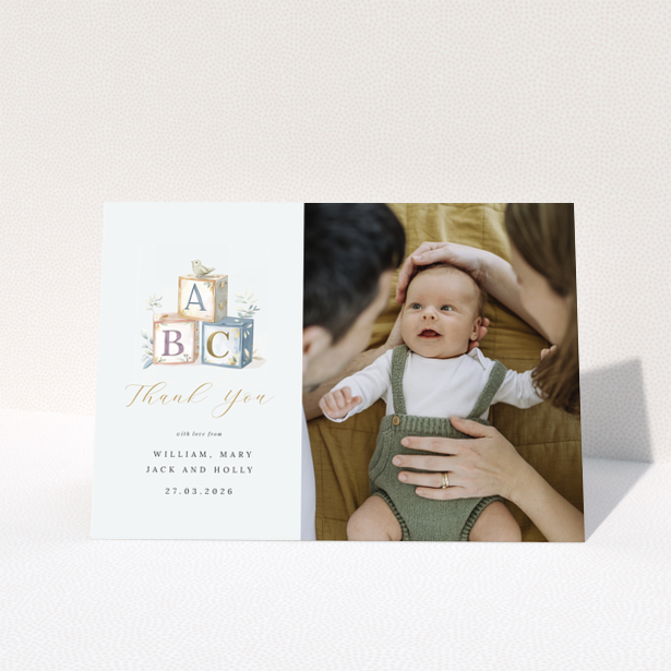 Baby thank you card with illustration of alphabet blocks and one photo of a baby with parents.