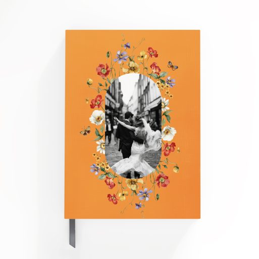 Orange floral-themed portrait notebook with one black and white photo on the cover design.