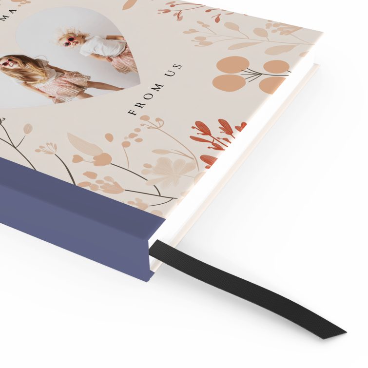 Floral personalised notebook cover design with heart-shaped photo cutout, featuring two photos, by Utterly Printable.