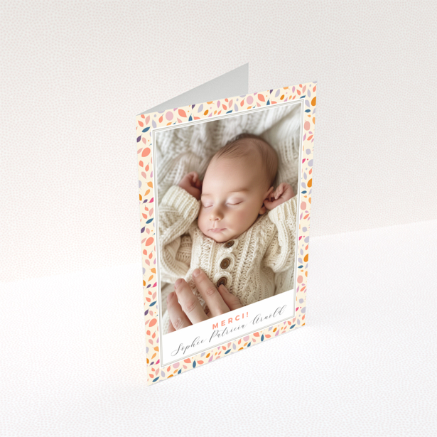 Baby thank you card with floral border and photo of sleeping baby