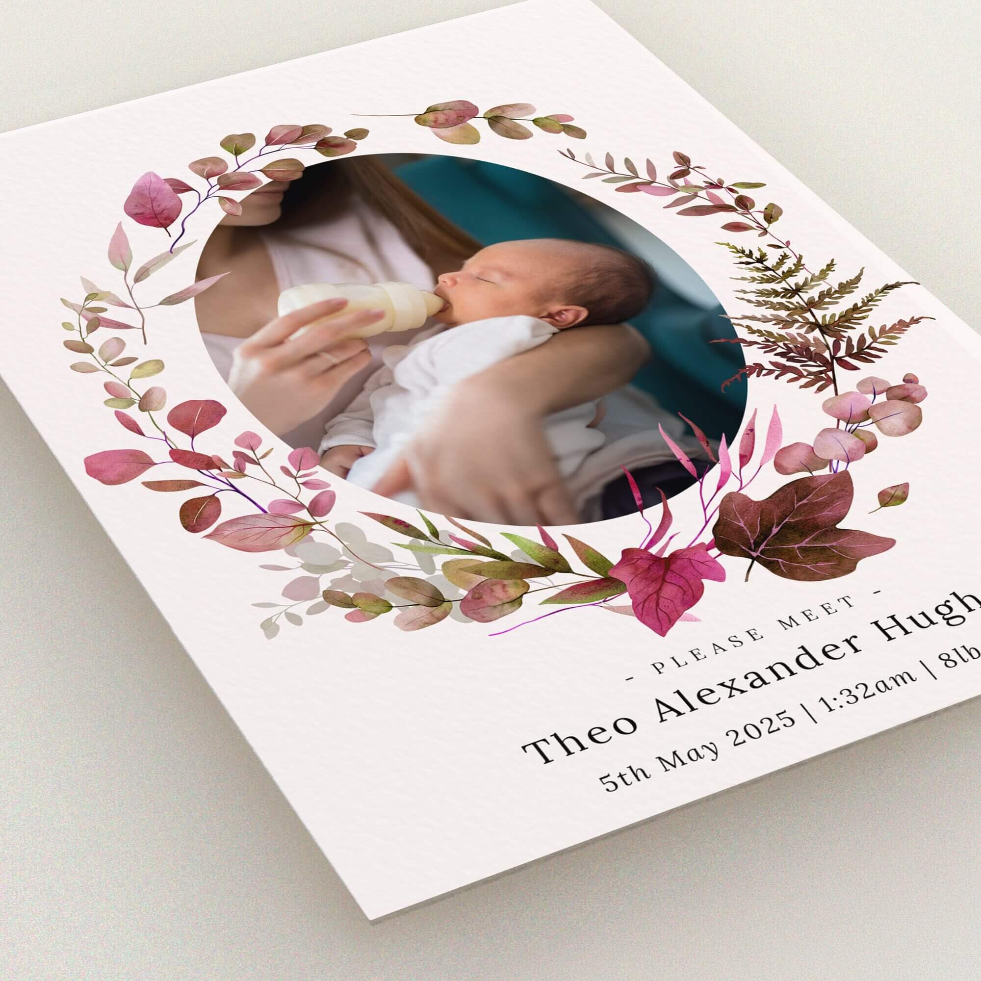 Floral birth announcement card design with one photo of a baby being bottle-fed.