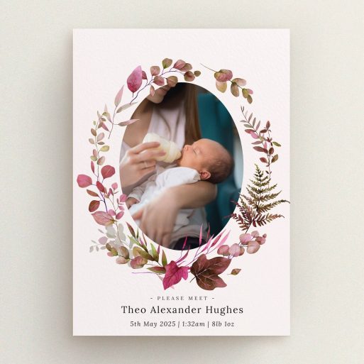 Floral birth announcement card design with one photo of a baby being bottle-fed.