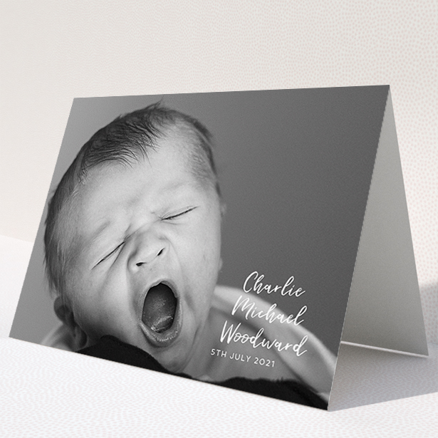 A baby card design called "1 Photo Full". It is an A5 card in a landscape orientation. It is a photographic baby card with room for 1 photo. "1 Photo Full" is available as a folded card, with mainly white colouring.