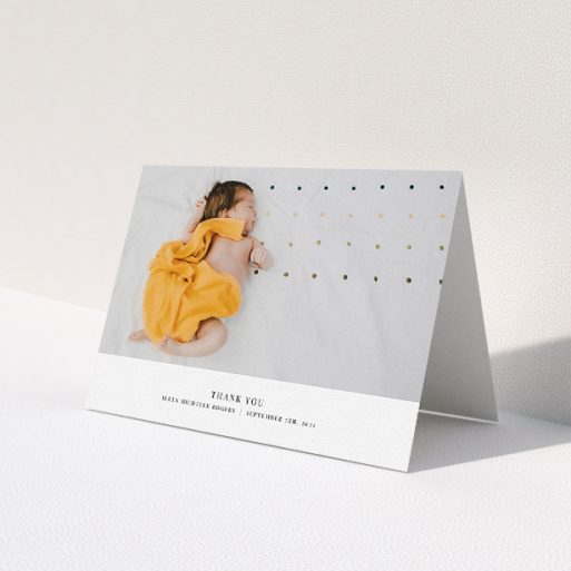 A baby card template titled 'A Modern Classic Thank You'. It is an A5 card in a landscape orientation. It is a photographic baby card with room for 1 photo. 'A Modern Classic Thank You' is available as a folded card, with mainly white colouring.