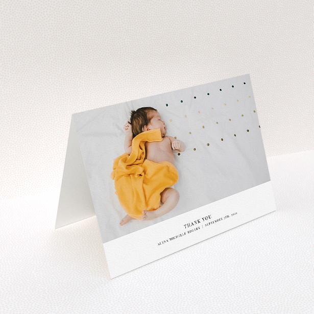 A baby card template titled "A Modern Classic Thank You". It is an A5 card in a landscape orientation. It is a photographic baby card with room for 1 photo. "A Modern Classic Thank You" is available as a folded card, with mainly white colouring.