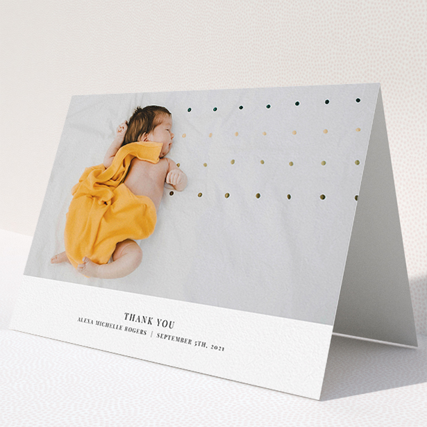 A baby card template titled "A Modern Classic Thank You". It is an A5 card in a landscape orientation. It is a photographic baby card with room for 1 photo. "A Modern Classic Thank You" is available as a folded card, with mainly white colouring.