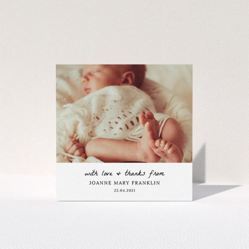 A baby card design titled "Black and White Thanks". It is a square (148mm x 148mm) card in a square orientation. It is a photographic baby card with room for 1 photo. "Black and White Thanks" is available as a folded card, with mainly white colouring.