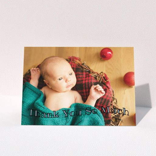 A baby card design named "Curvy Thanks". It is an A6 card in a landscape orientation. It is a photographic baby card with room for 1 photo. "Curvy Thanks" is available as a folded card, with mainly blue colouring.
