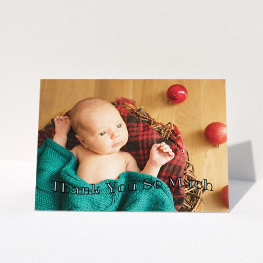 A baby card design named "Curvy Thanks". It is an A6 card in a landscape orientation. It is a photographic baby card with room for 1 photo. "Curvy Thanks" is available as a folded card, with mainly blue colouring.