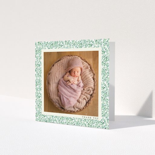 A baby card design titled 'Hedgerow Frame'. It is a square (148mm x 148mm) card in a square orientation. It is a photographic baby card with room for 1 photo. 'Hedgerow Frame' is available as a folded card, with tones of green and white.