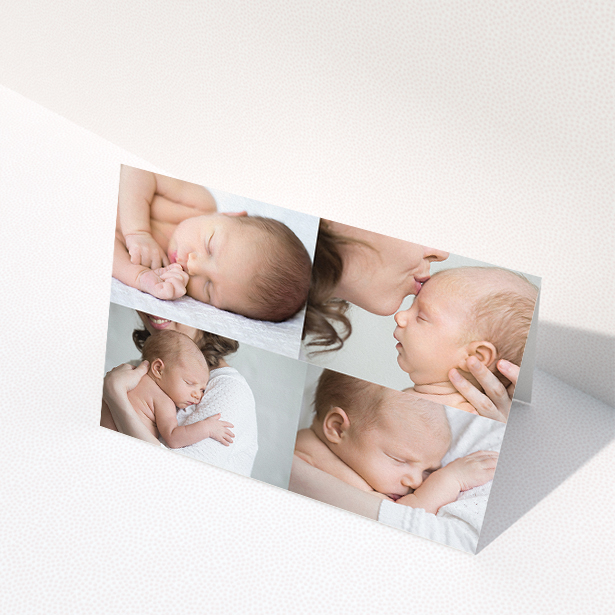 A baby card named "No Border Frames". It is an A5 card in a landscape orientation. It is a photographic baby card with room for 4 photos. "No Border Frames" is available as a folded card, with mainly white colouring.