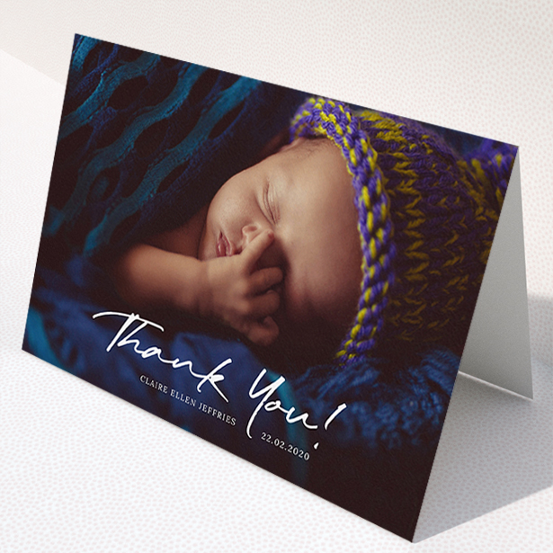 A baby card called "Simple Appreciation". It is an A5 card in a landscape orientation. It is a photographic baby card with room for 1 photo. "Simple Appreciation" is available as a folded card, with mainly white colouring.