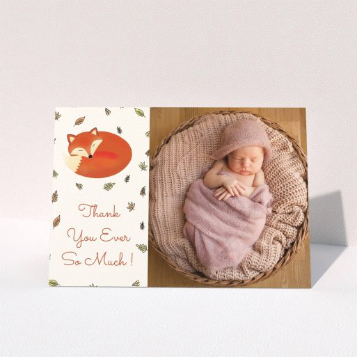 A baby card design named "Sleepy Fox". It is an A6 card in a landscape orientation. It is a photographic baby card with room for 1 photo. "Sleepy Fox" is available as a folded card, with tones of cream, orange and light yellow.
