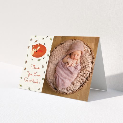 A baby card design named 'Sleepy Fox'. It is an A6 card in a landscape orientation. It is a photographic baby card with room for 1 photo. 'Sleepy Fox' is available as a folded card, with tones of cream, orange and light yellow.