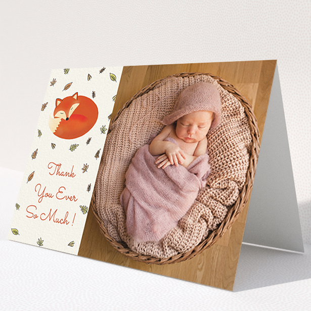 A baby card design named "Sleepy Fox". It is an A6 card in a landscape orientation. It is a photographic baby card with room for 1 photo. "Sleepy Fox" is available as a folded card, with tones of cream, orange and light yellow.